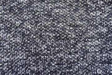 Fototapeta premium Texture of dark blue melange woolen fabric