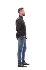 Fototapeta premium side view. modern young man in jeans