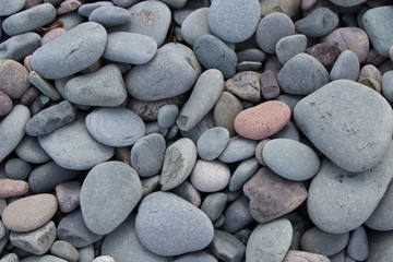 closes up of weathered rocks on the beach