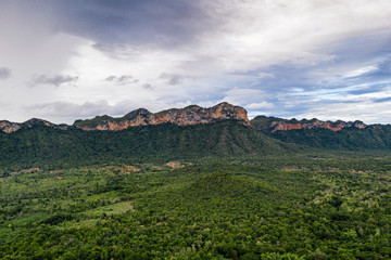 Fototapeta na wymiar Tropical rainforest with mountain and blue sky in national park