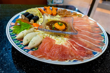 Raw food in the plate consists of vegetables and meats egg to cook, good for health