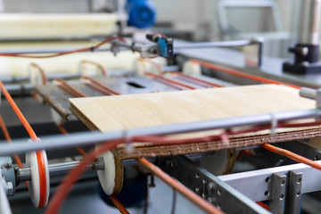 ready-made multi-layer wafer on the conveyor of a confectionery factory