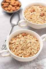 Granola, oatmeal with almond food background