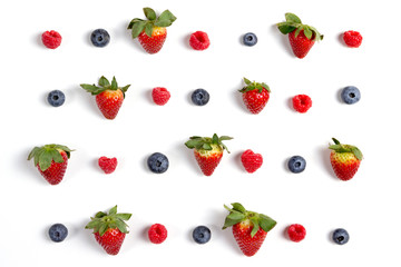 Mixed berries strawberry blueberry raspberry  flat lay photo shooting on clean white background