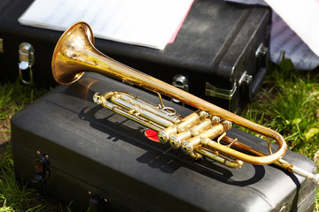 Fototapeta na wymiar A closeup of a golden musical trumpet