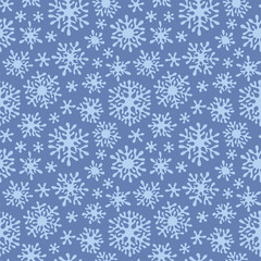 Christmas seamless doodle pattern with snowflakes
