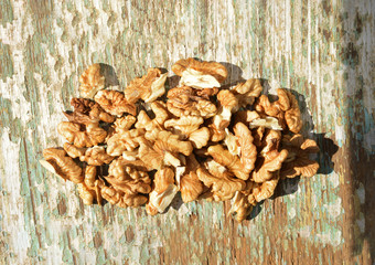 organic walnuts on wooden background