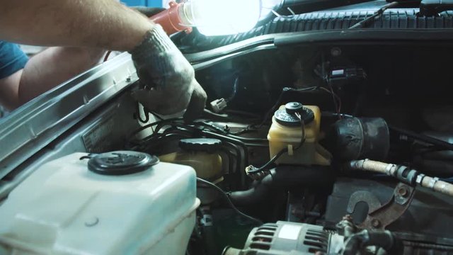 Photo of repair of a running gear of the car hands