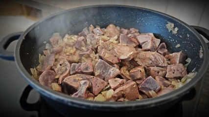 heart and liver from a red deer fawn with onions roasted