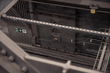 View of the plant from the outside, pipes smoke, wind turbines in the sea, barrels, tanks, thermal power plant, modern, technological waste processing plant, garbage processing plant