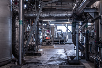View of the plant from the outside, pipes smoke, wind turbines in the sea, barrels, tanks, thermal power plant, modern, technological waste processing plant, garbage processing plant