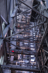 View of the plant from the outside, pipes smoke, wind turbines in the sea, barrels, tanks, thermal power plant, modern, technological waste processing plant, garbage processing plant