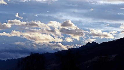 Fototapeta na wymiar beautiful morning sky in the mountains with orange clouds