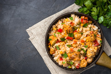 Rice with chicken and vegetables top view.