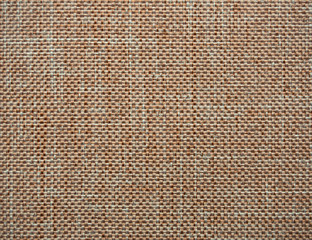 Close-up of hessian sackcloth woven vintage style material texture pattern background in beige color for used as backdrop or background