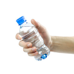 Hand holding a blue bottle of drinking water. Close up. Isolated on white background