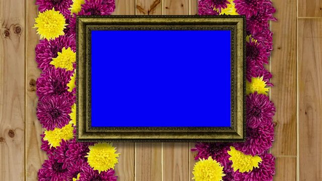 Vintage picture frame with colourful flowers
