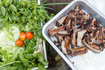 Grill marinade pork rib with fresh vegetables basket, food background, diet food