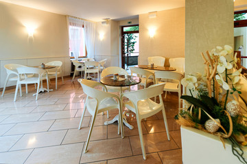 Hotel and breakfast restaurant interior with background architecture