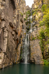 Véu da Noiva Waterfall, with natural pool and rocky wall, Serra do Cipó National Park, Minas Gerais, Brazil