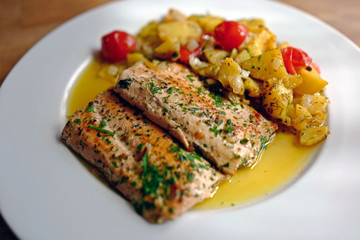 healthy and fresh cooking at home - salmon fillet with potatoes in olive oil