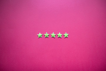 Feedback with five stars on blackboard. Service rating, satisfaction concept