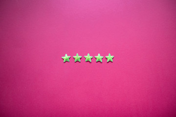 Feedback with five stars on blackboard. Service rating, satisfaction concept