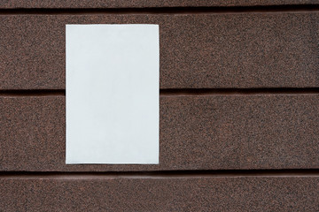 Fototapeta premium white blank signboard blank for your text on mosaic marble plaster wall. copy space