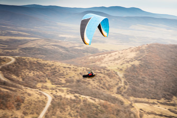 Paragliding over the mountains