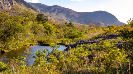 River with lake, cerrado vegetation and mountains, Serra do Cipo National Park, Minas Gerais, Brazil