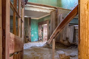 Ruined room fill with sand in Kolmanskop