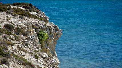 Aegean sea coast and sandy coves and paths