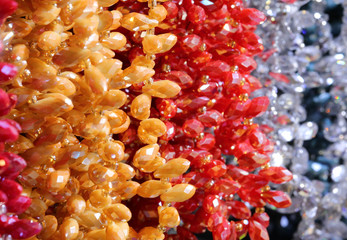 macro background of many necklaces made with hard stones