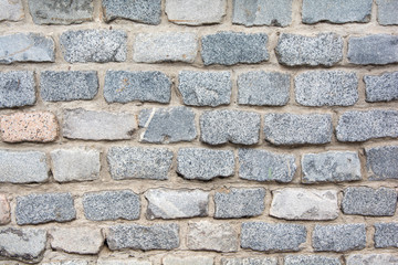 muro de adoquines de piedra gris