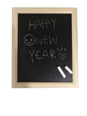 Fototapeta premium The word happy new year on the blackboard.Chalk and blackboard on a white background.