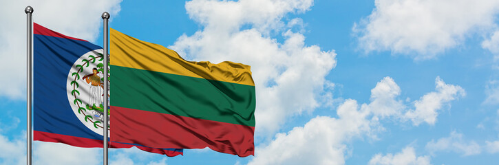 Belize and Lithuania flag waving in the wind against white cloudy blue sky together. Diplomacy concept, international relations.