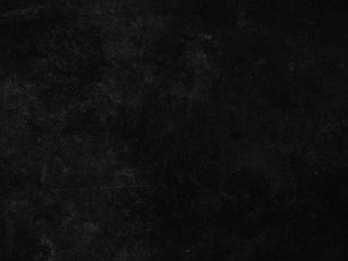 Black textured grunge background. Industrial concrete wall as background for designs.