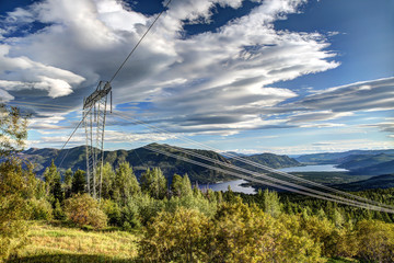 Fototapeta na wymiar High tension power lines in the interior mountains of British Columbia