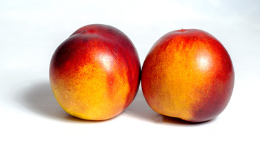 fresh peaches isolated on white background.