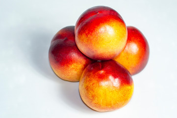 fresh peaches isolated on white background.