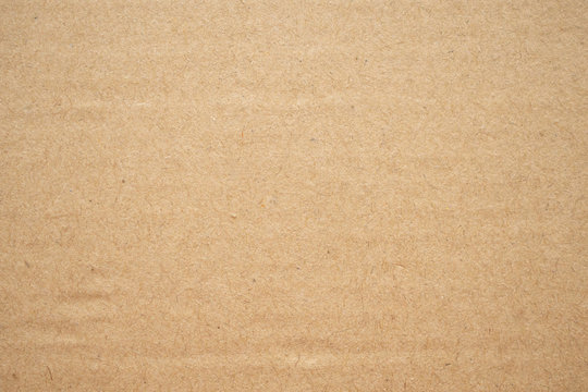 Abstract brown recycled cardboard paper texture background