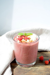 Fresh raspberries and bananas   smoothies  Healthy food concept
