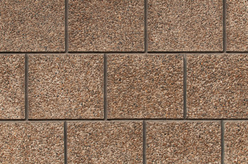 Modern neat brick brown wall.