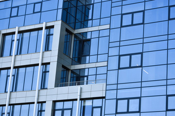 Obraz premium Modern office modern building with blue windows.