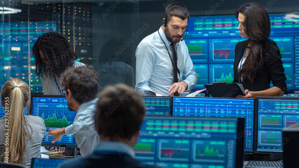 Poster multi-ethnic team of traders is busy working at the stock exchange office. dealers and brokers buy a