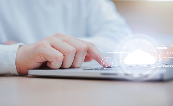 programmer man hand typing on keyboard for transfer or synch data upload and download from cloud computing with virtual interface in operation room, technology business concept	