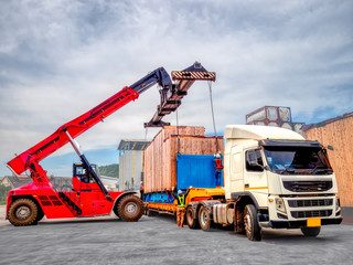 The over high cargo to lifting with the special equipment and control by foreman in yard.