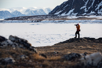Fototapeta premium Wildlife photographers on Bylot Island near Pond Inlet, Nunavut, Canada