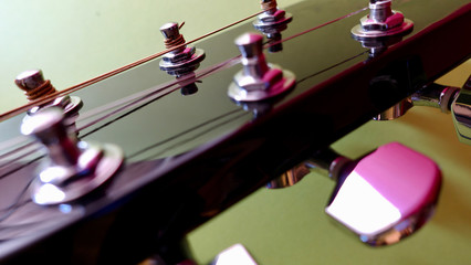 guitar headstock with tuning pegs . color background