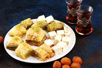 Baklava on table. Middle eastern or arabic dishes. Turkish Dessert Baklava with pistachio on rustic...